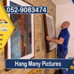 How to Hang Many Picture Frames Evenly